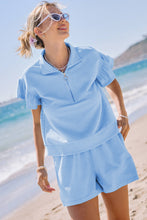 Load image into Gallery viewer, Beau Blue Ribbed Texture Half Zip Ruffled Short Sleeve Top and Shorts Set