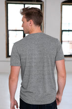 Load image into Gallery viewer, Unisex Eco-Triblend Short Sleeve V-Neck Tee
