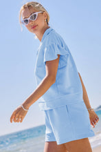 Load image into Gallery viewer, Beau Blue Ribbed Texture Half Zip Ruffled Short Sleeve Top and Shorts Set
