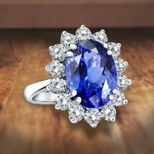 Load image into Gallery viewer, Princess Diana Inspired 3.00CTW AGI Certified G/VS Lab-Grown Sapphire and Diamond Halo Ring in 14K White Gold

